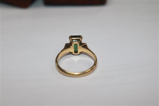 An 18ct gold and platinum, green tourmaline and diamond ring, size M.